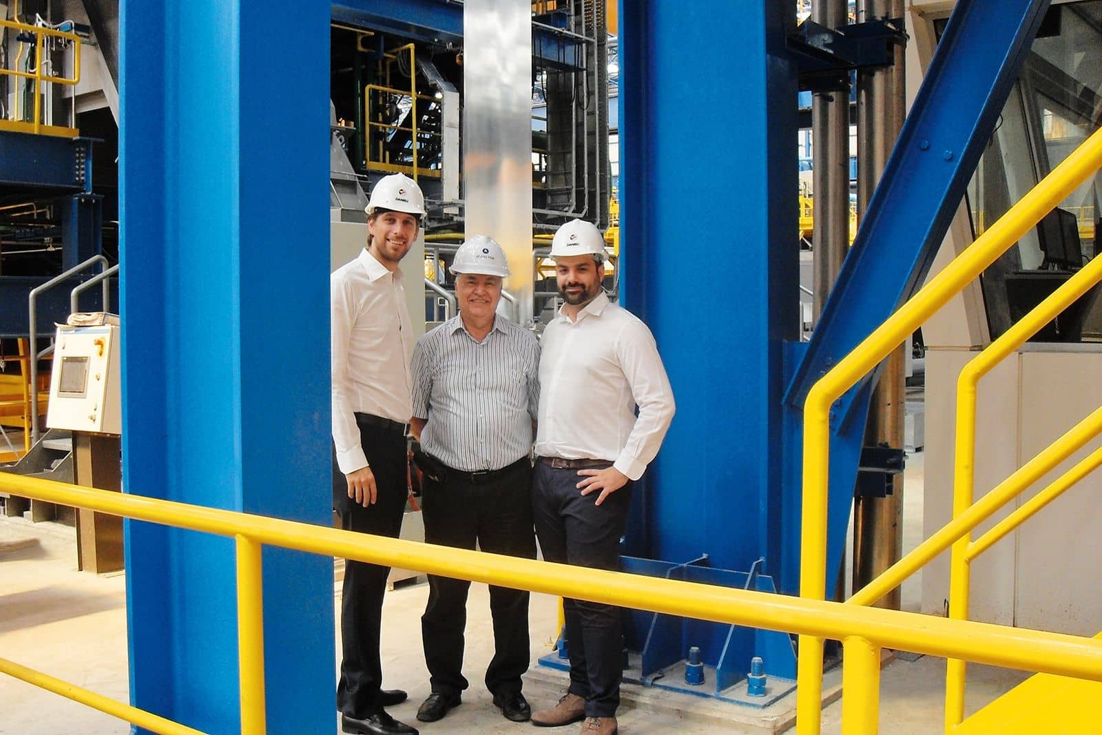 Hot dip galvanizing line during production. From left: Tommaso Settimo, VP of Danieli Wean United;  Mr. Tuncer Cakici Project Leader, Atakaş; Sandro Adragna, Project Leader, Danieli Wean United